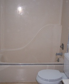 Almond Fiberglass One PIece Tub and Shower Refinished to White